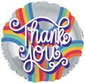 The CTI 18" Thank You Rainbow Foil Balloon is round and silver, displaying “Thank you” in bold white script over radiant rainbow stripes—an eye-catching appreciation gift.