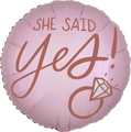 The Anagram/MD 18" Blush Wedding Foil Balloon features "She Said Yes!" in bold script beside a diamond ring illustration on a round pink design.