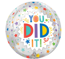 Celebrate any achievement with the 16" Orbz Clear You Did It! Foil Balloon from Anagram/MD, featuring vibrant multicolored stars and bold "You Did It!" lettering in the center.