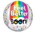 Le ballon Orbz Clear Feel Better Soon ! d'Anagram/MD présente des gouttes de pluie colorées et un fond arc-en-ciel avec "Feel Better Soon !" en grand texte sur un nuage, ce qui en fait un choix édifiant pour envoyer des vœux de guérison.