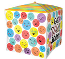 The 15" UltraShape Cubez Get Well Soon! Foil Balloon by Anagram/MD is cube-shaped, featuring colorful smiling faces on three sides and "Get Well Soon!" in bold letters on a striped background on the fourth.