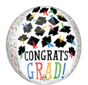 The 16" Hats Off Congrats Grad Orbz Foil Balloon by Anagram/MD features a round design with black graduation caps, colorful tassels and confetti, plus "CONGRATS GRAD!" in bold multicolored letters.