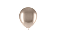 A single 5'' Balloonia Latex Balloon in Brilliant Beige from the Professional Line (100 per bag) by Balloonia is floating against a plain white background.