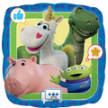 The Anagram/MD 18" Standard Toy Story 5 Foil Balloon features beloved characters—a smiling green dinosaur, white unicorn with a yellow horn, pink piggy bank, and green alien—framed by blue and green borders with chat bubbles.