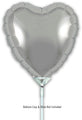 A 9" silver heart-shaped Oaktree foil balloon (airfill only, self sealing valve) is shown attached to a white cup and stick. Background is plain white. Text below reads: Balloon cup & stick not included. Pack includes 5 balloons.