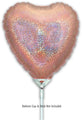 A holographic rose gold heart-shaped foil balloon (9", airfill only with self-sealing valve) by Oaktree is shown. Balloon cup and stick are not included. Comes in packs of 5.