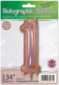 A packaged 34" Number 1 Holographic Rose Gold Foil Balloon by Oaktree features "Holographic Balloon, 34 in / 86.4 cm, Inflate with Helium or Air" on the packaging, plus a UK flag and barcode at the bottom.