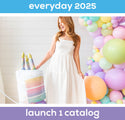 A woman in a white dress stands by a large pastel rainbow cake and an Anagram/MD 28" Holographic SuperShape Pearlized Birthday Foil Balloon. “Everyday 2025” appears above and “Launch 1 catalog” below, creating a bright, festive scene.