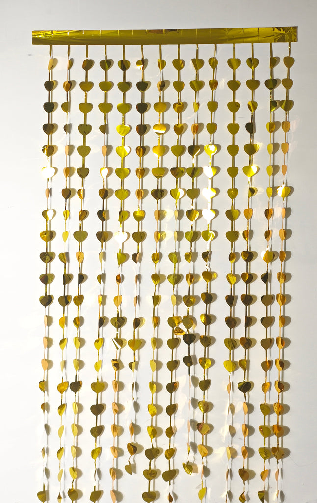 Fringe Tinsel Heart Curtain Backdrop in the Color of Gold. Made by Mylargram.
