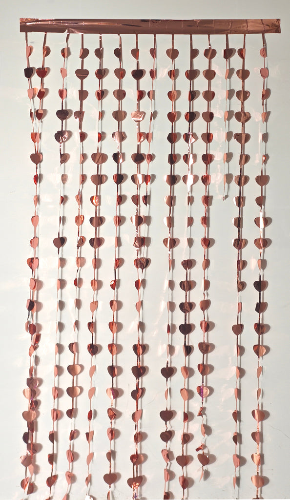 Fringe Tinsel Heart Curtain Backdrop in the Color of Rose Gold. Made by Mylargram.