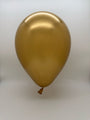 An 18" Balloonia Latex Balloons Professional Line Brilliant Gold balloon floats against a plain white background. Brand: Balloonia. Each bag contains 10 balloons.