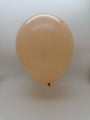 A single 12'' Balloonia Brand Professional Line Latex Balloon in Decolink Standard Nude floats against a plain, light gray background.