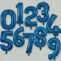 An Oaktree 34″ Number 7 Metallic Navy Blue Foil Balloon is displayed on a light gray background, with a tied string at the bottom.