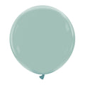 A fully inflated, large, round 24″ Cattex Brand Premium Vintage Blue Latex Balloon is floating against a plain white background.
