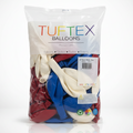 Bag of Tuftex balloons with red, blue, and white balloons inside on a white background