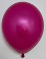 A single 12″ Metallic Magenta Decomex latex balloon from a 100-count bag is shown against a plain white background.