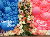 A floral arrangement stands between clusters of blue and pink balloons, with the pink ones labeled as 12″ Kalisan Latex Heart Balloons Standard Queen Pink (25 Per Bag), featuring the Kalisan brand name at the bottom.